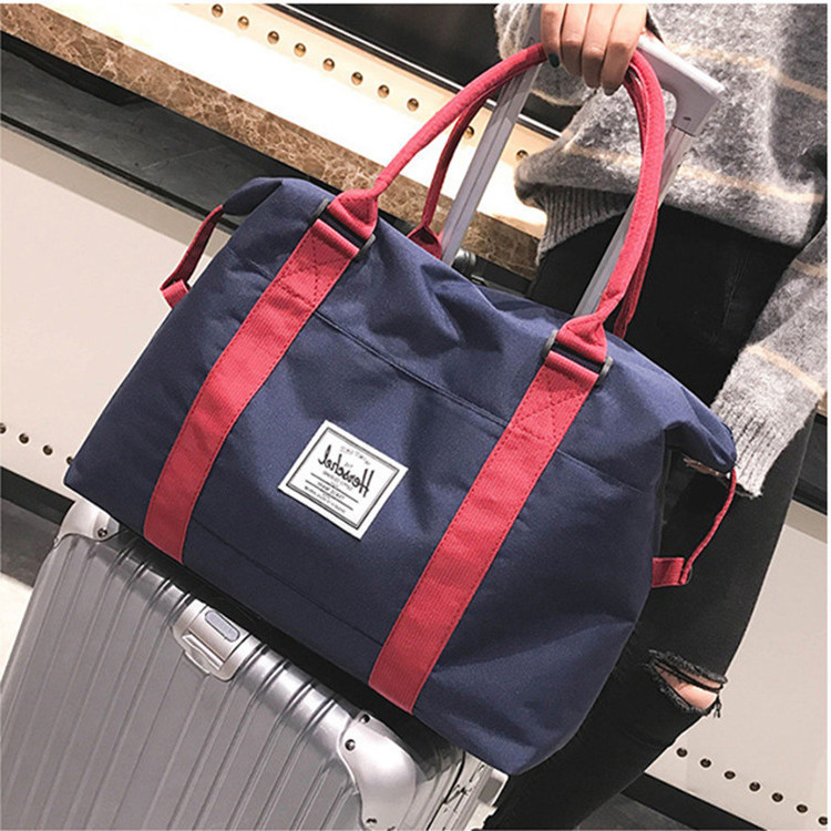 旅行出差帆布手提包大容量男士行李袋健身便携短途套拉杆女登机包