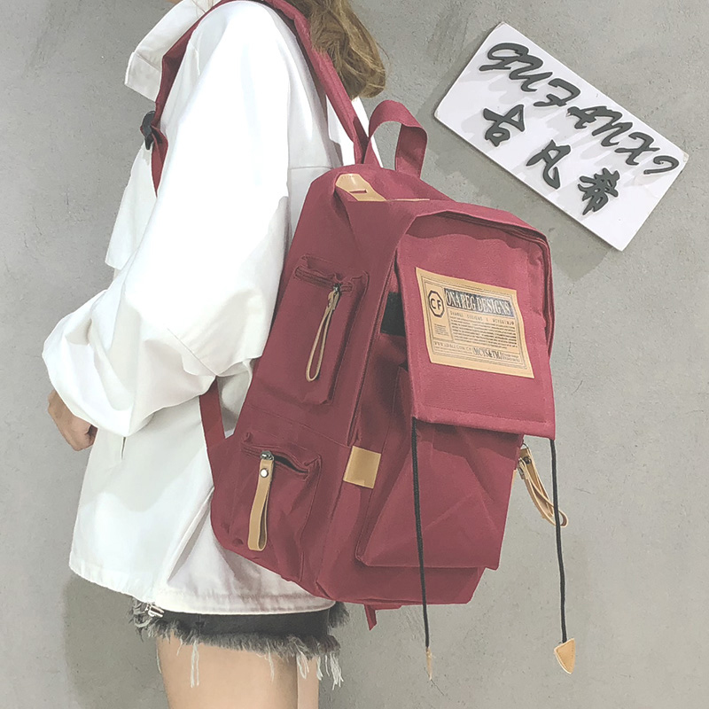 帆布韩版双肩包男背包电脑包学院风大学生书包女休闲大容量旅行包