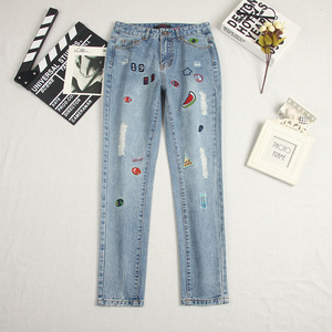国内品牌专柜换季商品绣花牛仔裤女卡通图案修身小脚长裤小可爱潮