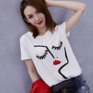  span class=h>意大利 /span>vicolo 重工珍珠睫毛水墨抽象闪闪红唇小