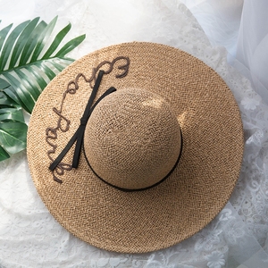 时尚大檐遮阳帽草帽假沙滩图片